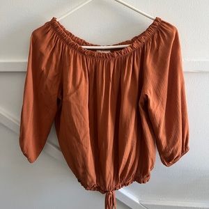 Orange flowy top